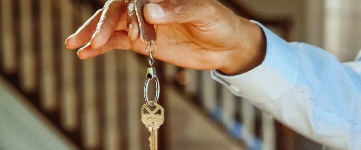 Unlocking the Hidden Value of Your Digital Real Estate Modern key unlocking the door to a bright, open space, symbolizing the unlocking of potential in digital real estate.